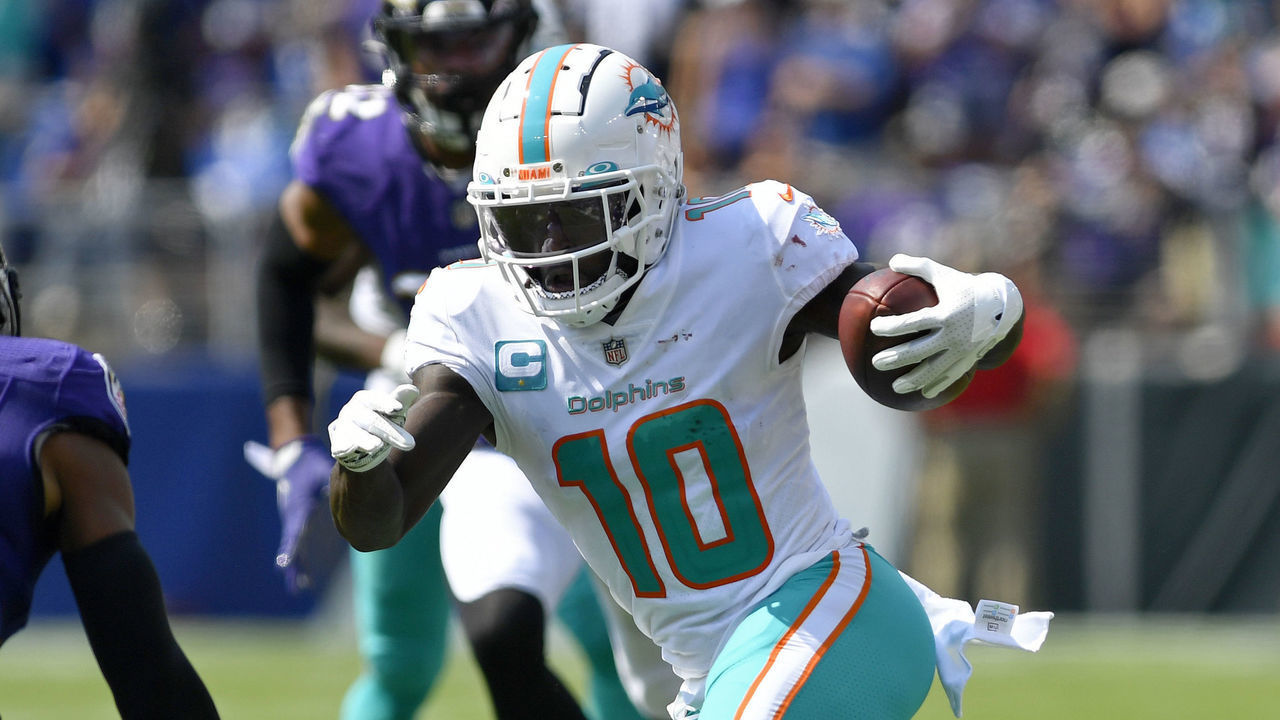 BALTIMORE, MD - SEPTEMBER 18: Miami Dolphins wide receiver Tyreek Hill (10) runs after a catch during the Miami Dolphins versus Baltimore Ravens NFL game at M&T Bank Stadium on September 18, 2022 in Baltimore, MD