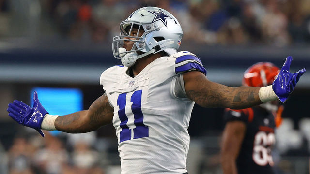 ARLINGTON, TEXAS - SEPTEMBER 18: Micah Parsons #11 of the Dallas Cowboys reacts after sacking Joe Burrow #9 of the Cincinnati Bengals (not pictured) during the third quarter at AT&T Stadium on September 18, 2022 in Arlington, Texas.
