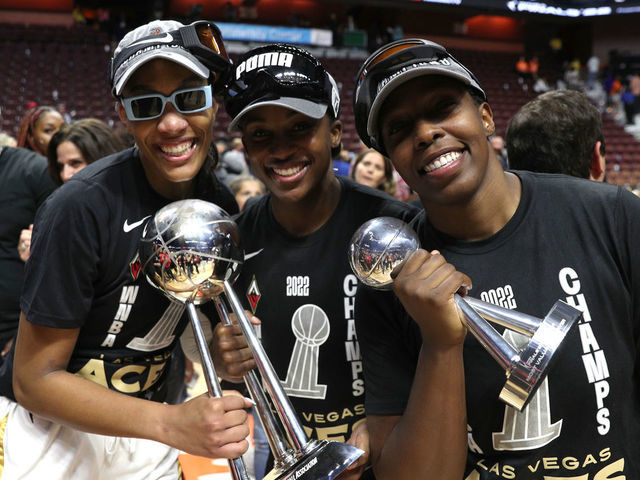 UNCASVILLE, CT - SEPTEMBER 18: A'ja Wilson #22, Jackie Young #0 and Chelsea Gray #12 of the Las Vegas Aces pose with the 2022 WNBA Championship after Game 4 of the 2022 WNBA Finals on September 18, 2022 at Mohegan Sun Arena in Uncasville, Connecticut. NOTE TO USER: User expressly acknowledges and agrees that, by downloading and/or using this Photograph, user is consenting to the terms and conditions of the Getty Images License Agreement. Mandatory Copyright Notice: Copyright 2022 NBAE