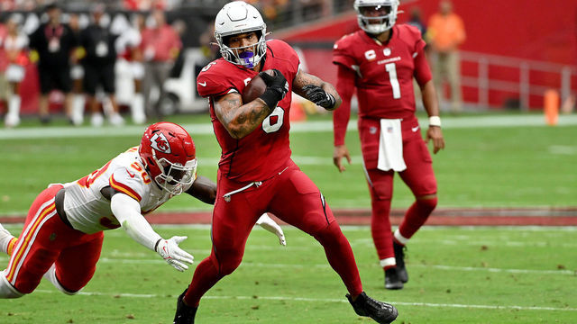GLENDALE, ARIZONA - SEPTEMBER 11: Running back James Conner #6 of the Arizona Cardinals runs with the ball as linebacker Willie Gay #50 of the Kansas City Chiefs closes in during the second quarter of the game at State Farm Stadium on September 11, 2022 in Glendale, Arizona.