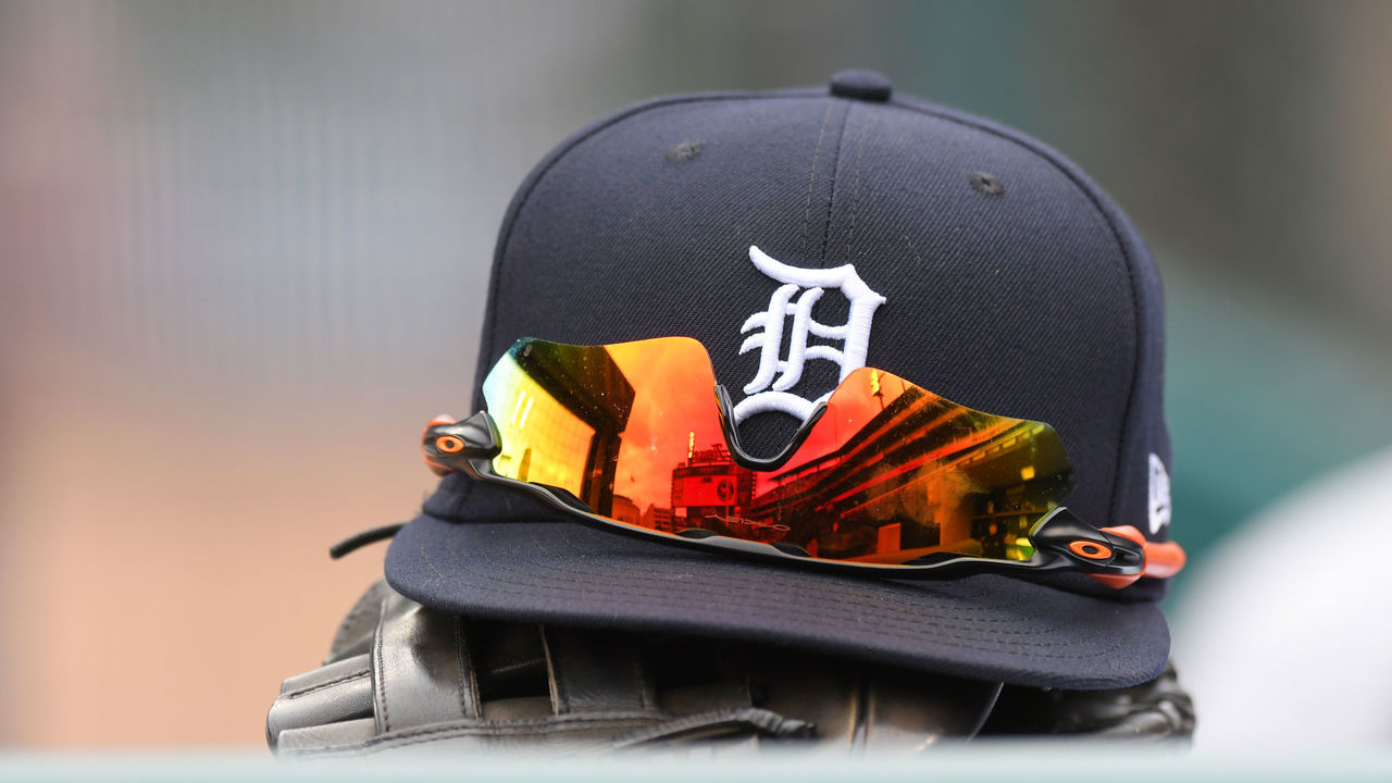 DETROIT, MI - APRIL 09: A detailed view of a Detroit Tigers baseball hat and sunglasses during the game against the Chicago White Sox at Comerica Park on April 9, 2022 in Detroit, Michigan. The White Sox defeated the Tigers 5-2.