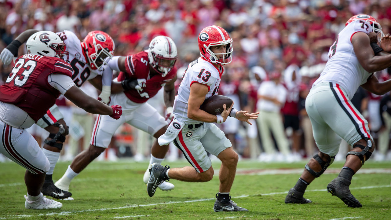 COLUMBIA, SC - SEPTEMBER 17: Georgia Bulldogs quarterback Stetson Bennett (13) scrambles up the field during a football game between the Georgia Bulldogs and the South Carolina Gamecocks on September 17, 2022, at Williams-Brice Stadium in Columbia, SC.