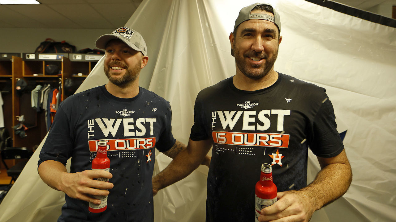 ST PETERSBURG, FLORIDA - SEPTEMBER 19: Ryan Pressly #55 and Justin Verlander #35 of the Houston Astros celebrate winning the American League West Division following a game against the Tampa Bay Rays at Tropicana Field on September 19, 2022 in St Petersburg, Florida.