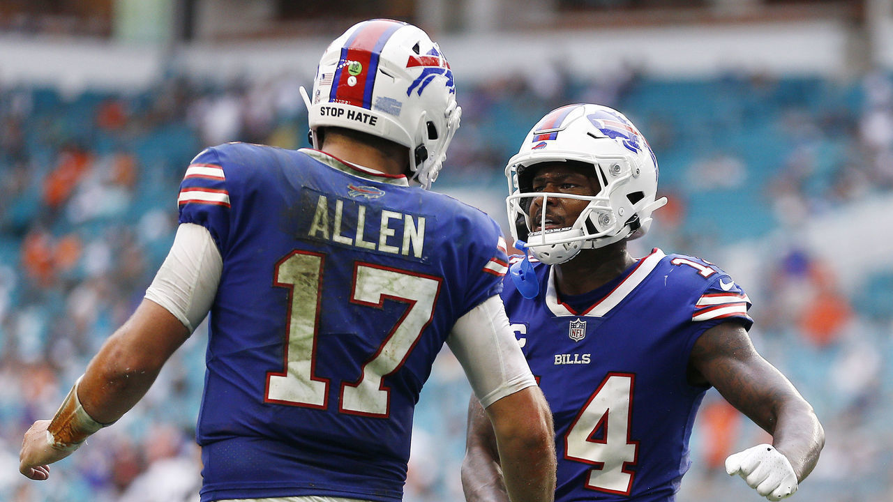 MIAMI GARDENS, FLORIDA - SEPTEMBER 19: Josh Allen #17 and Stefon Diggs #14 of the Buffalo Bills celebrate during the fourth quarter against the Miami Dolphins at Hard Rock Stadium on September 19, 2021 in Miami Gardens, Florida.