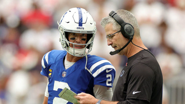 HOUSTON, TEXAS - SEPTEMBER 11: Matt Ryan #2 speaks with head coach Frank Reich of the Indianapolis Colts during the fourth quarter against the Houston Texans at NRG Stadium on September 11, 2022 in Houston, Texas.