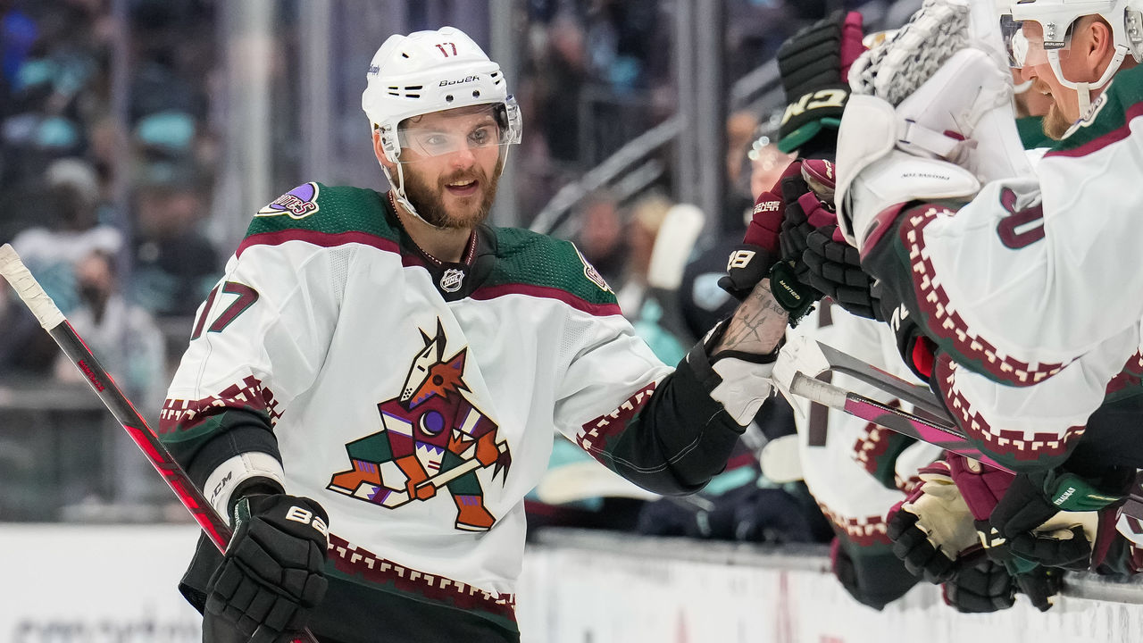 SEATTLE, WASHINGTON - FEBRUARY 09: Alex Galchenyuk #17 of the Arizona Coyotes celebrates his goal at the bench during the third period of a game between the Arizona Coyotes and the Seattle Kraken at Climate Pledge Arena on February 09, 2022 in Seattle, Washington.