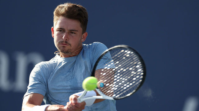 NEW YORK, NEW YORK - AUGUST 31: J.J. Wolf of the United States plays a backhand against Alejandro Tabilo of Chile in their Men's Singles Second Round match on Day Three of the 2022 US Open at USTA Billie Jean King National Tennis Center on August 31, 2022 in the Flushing neighborhood of the Queens borough of New York City.
