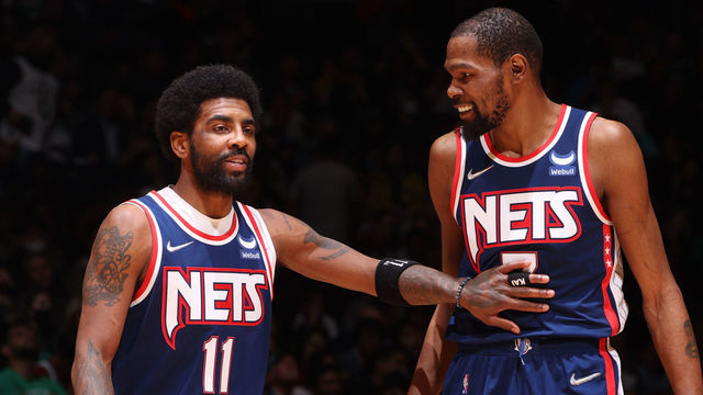 BROOKLYN, NY - APRIL 25: Kyrie Irving #11 talks to Kevin Durant #7 of the Brooklyn Nets during Round 1 Game 4 of the 2022 NBA Playoffs on April 25, 2022 at Barclays Center in Brooklyn, New York. Mandatory Copyright Notice: Copyright 2022 NBAE