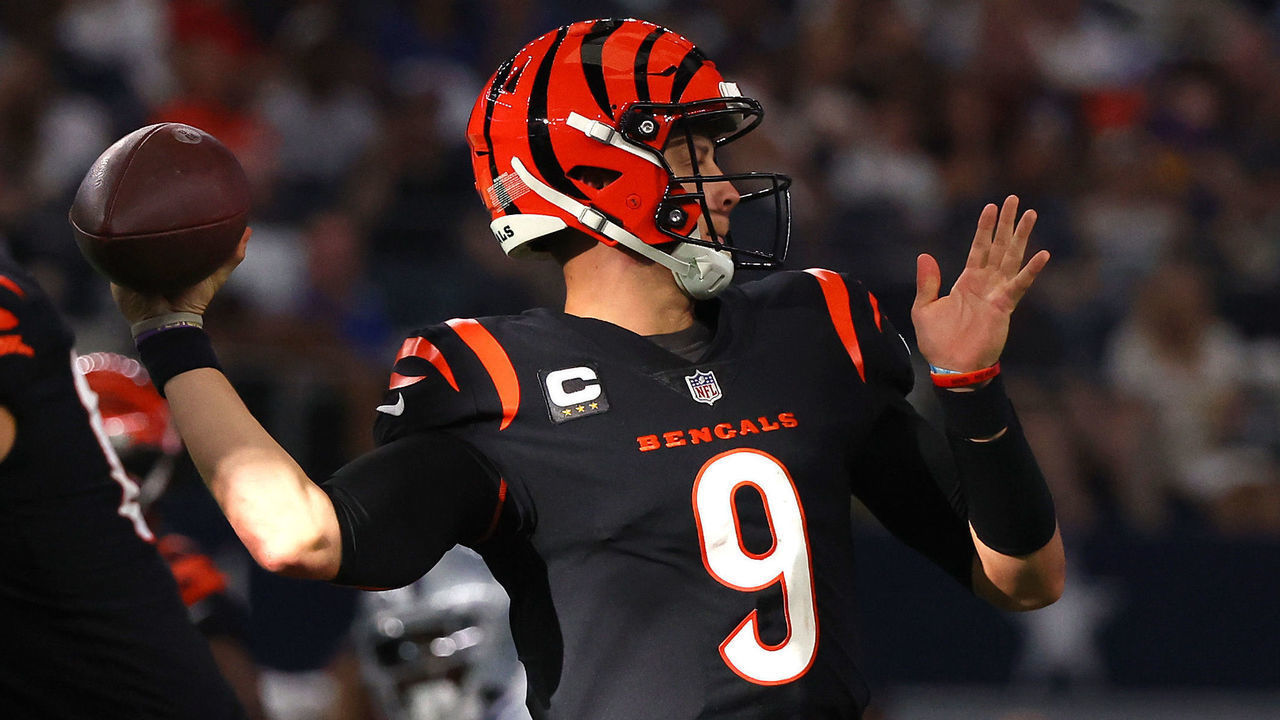 ARLINGTON, TEXAS - SEPTEMBER 18: Joe Burrow #9 of the Cincinnati Bengals passes the ball against the Dallas Cowboys during the second half at AT&T Stadium on September 18, 2022 in Arlington, Texas.