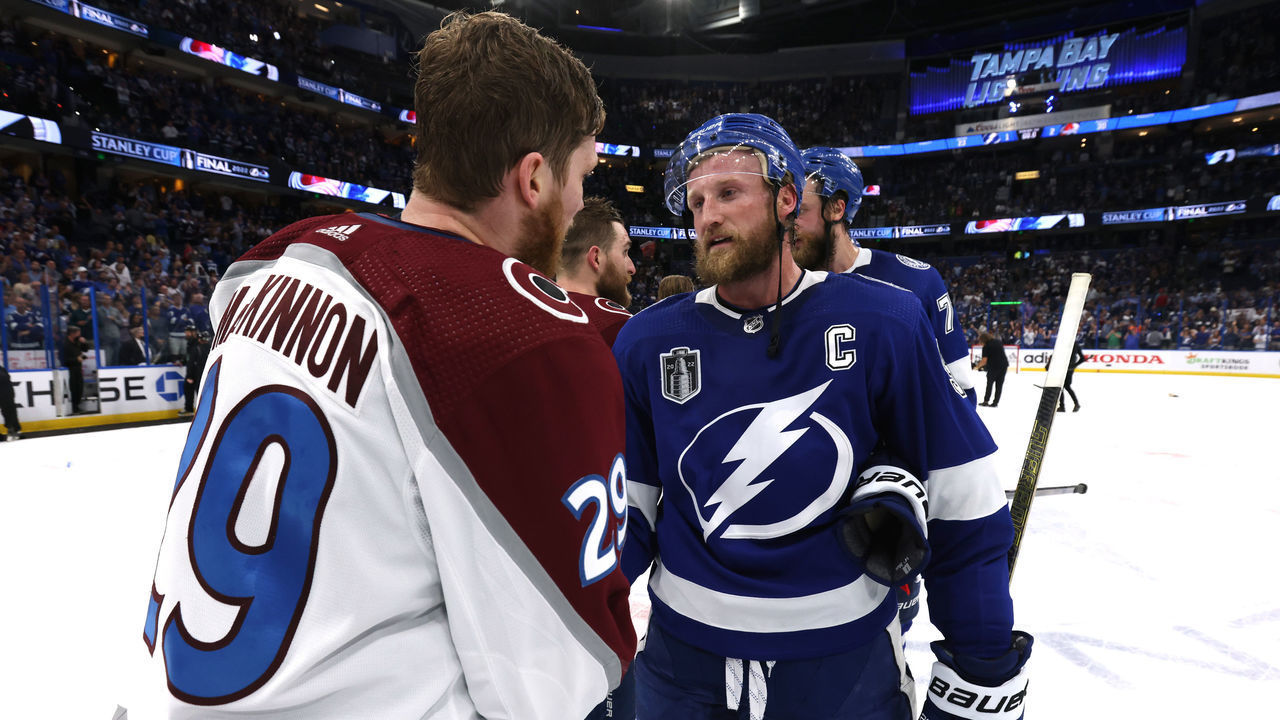 TAMPA, FLORIDA - JUNE 26: Nathan MacKinnon #29 of the Colorado Avalanche and Steven Stamkos #91 of the Tampa Bay Lightning shake hands after Game Six of the 2022 Stanley Cup Final at Amalie Arena on June 26, 2022 in Tampa, Florida. The Colorado Avalanche defeated the Tampa Bay Lightning 2-1 in Game Six to take the best of seven Stanley Cup Final series 4 games to 2.