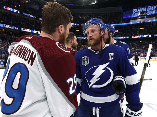 TAMPA, FLORIDA - JUNE 26: Nathan MacKinnon #29 of the Colorado Avalanche and Steven Stamkos #91 of the Tampa Bay Lightning shake hands after Game Six of the 2022 Stanley Cup Final at Amalie Arena on June 26, 2022 in Tampa, Florida. The Colorado Avalanche defeated the Tampa Bay Lightning 2-1 in Game Six to take the best of seven Stanley Cup Final series 4 games to 2.