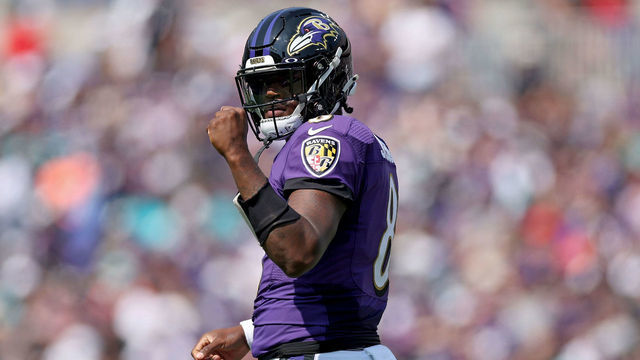 BALTIMORE, MARYLAND - SEPTEMBER 18: Lamar Jackson #8 of the Baltimore Ravens celebrates a penalty call in the first quarter against the Miami Dolphins at M&T Bank Stadium on September 18, 2022 in Baltimore, Maryland.