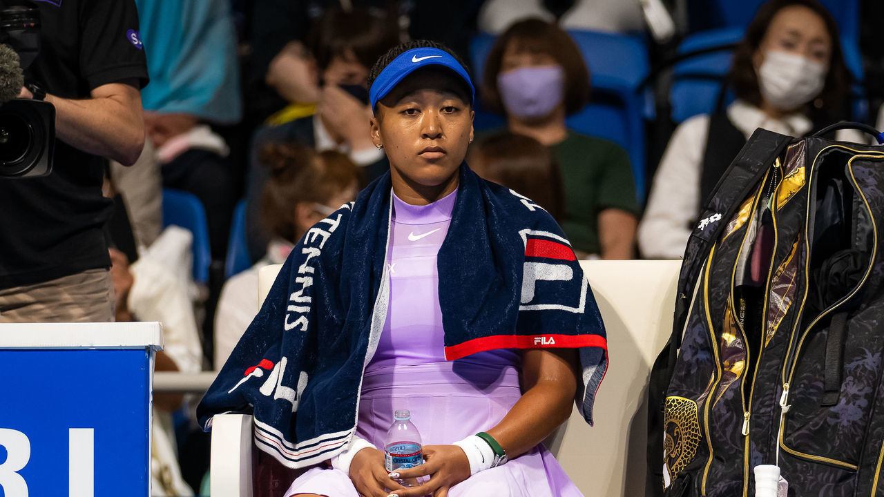 TOKYO, JAPAN - SEPTEMBER 20: Naomi Osaka of Japan watches on as opponent Daria Saville of Australia receives medical treatment after Saville took a fall early into their first round match on Day 2 of the Toray Pan Pacific Open at Ariake Coliseum on September 20, 2022 in Tokyo, Japan