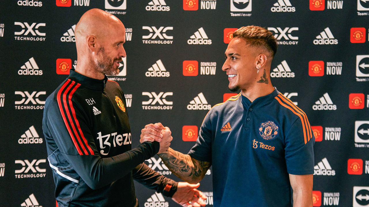 MANCHESTER, ENGLAND - SEPTEMBER 01: New Manchester United signing Antony is greeted by Manchester United Head Coach / Manager Erik ten Hag at Carrington Training Ground on September 01, 2022 in Manchester, England.