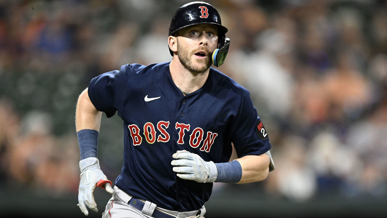 BALTIMORE, MARYLAND - SEPTEMBER 10: Trevor Story #10 of the Boston Red Sox runs to first base against the Baltimore Orioles at Oriole Park at Camden Yards on September 10, 2022 in Baltimore, Maryland.
