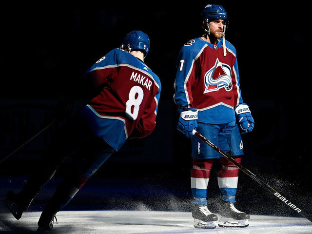 DENVER, CO - MAY 25: Colorado Avalanche defenseman Cale Makar (8) and defenseman Devon Toews (7) stand on the ice during starting lineup introductions during a Stanley Cup Playoffs round 2 game between the St. Louis Blues and the Colorado Avalanche at Ball Arena in Denver, Colorado on May 25, 2022.