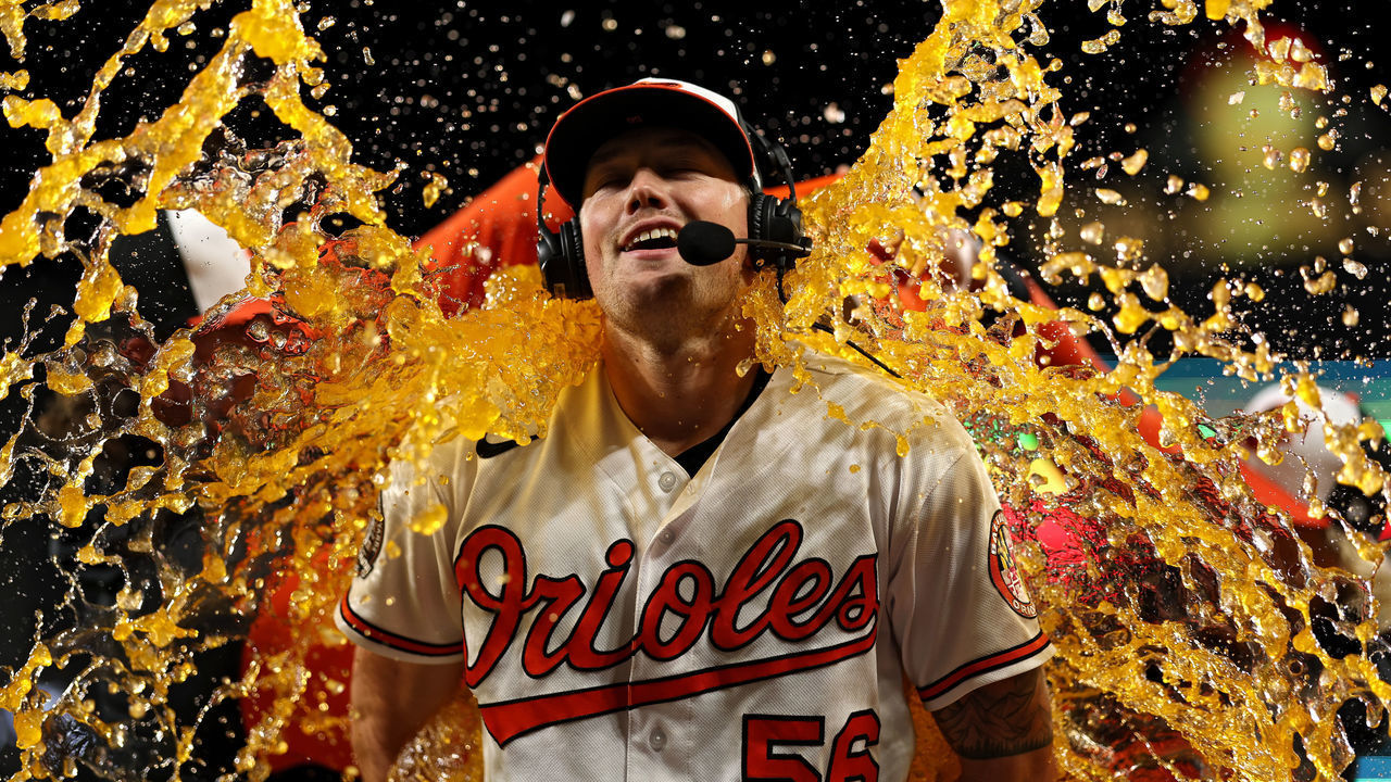 BALTIMORE, MARYLAND - SEPTEMBER 22: Starting pitcher Kyle Bradish #56 of the Baltimore Orioles is doused with Gatorade after defeating the Houston Astros at Oriole Park at Camden Yards on September 22, 2022 in Baltimore, Maryland.