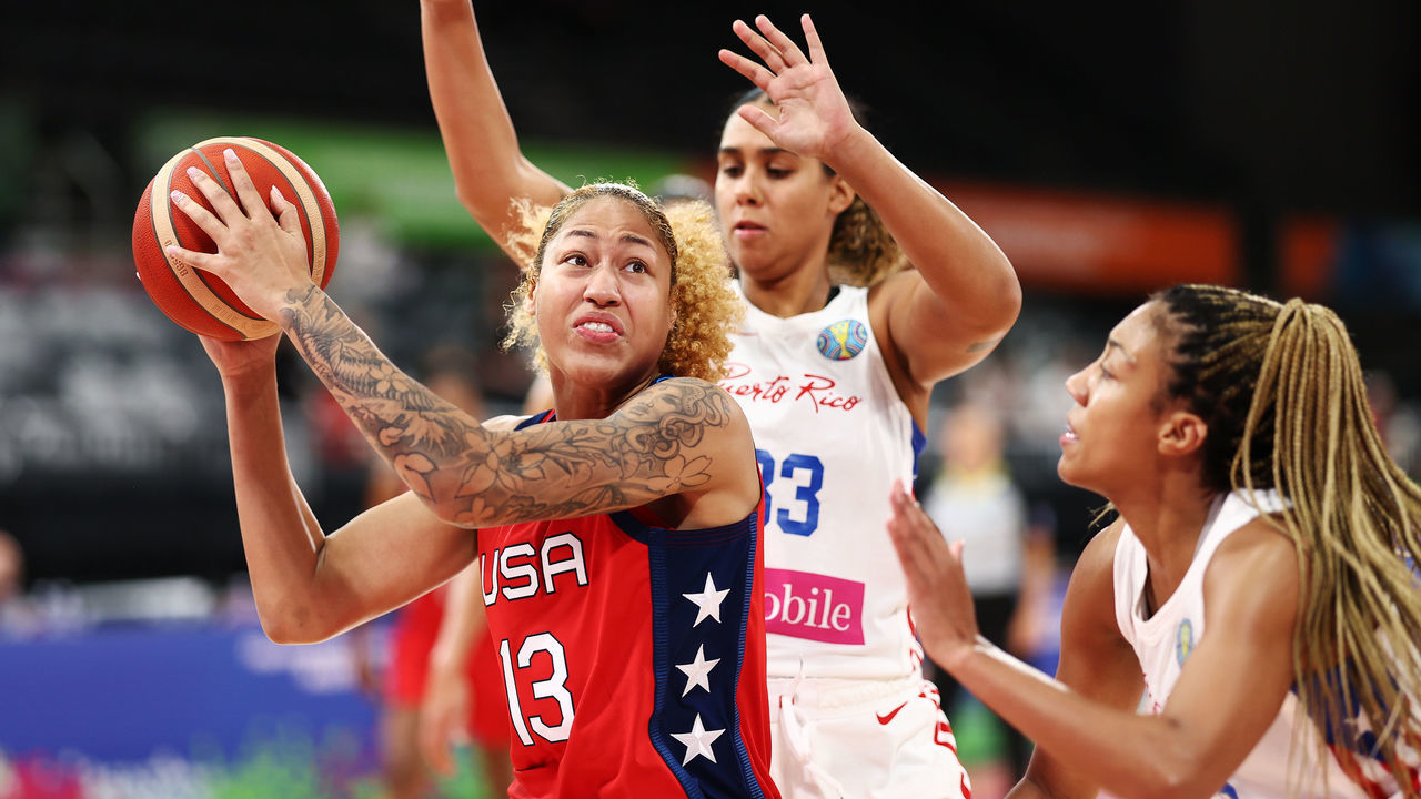 SYDNEY, AUSTRALIA - SEPTEMBER 23: Shakira Austin of the United States competes with India Pagan of Puerto Rico for a rebound during the 2022 FIBA Women's Basketball World Cup Group A match between Puerto Rico and USA at Sydney Olympic Park Sports Centre, on September 23, 2022, in Sydney, Australia.