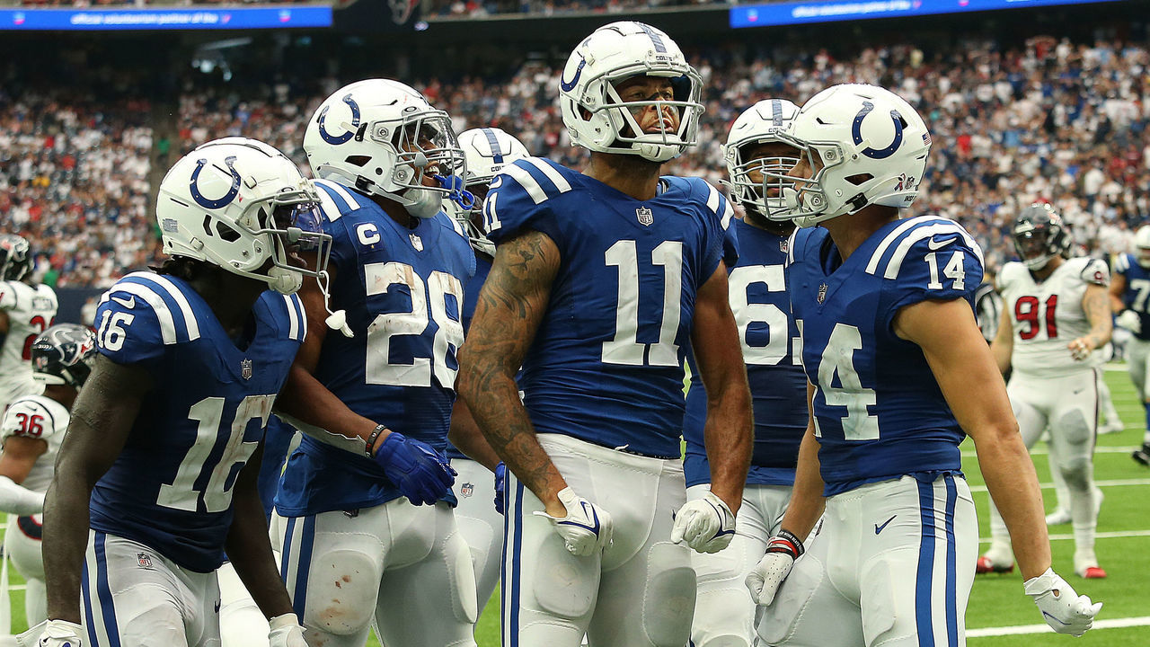 HOUSTON, TEXAS - SEPTEMBER 11: Indianapolis Colts wide receiver Michael Pittman Jr. #11 celebrates scoring a touchdown against the Houston Texans at NRG Stadium on September 11, 2022 in Houston, Texas.