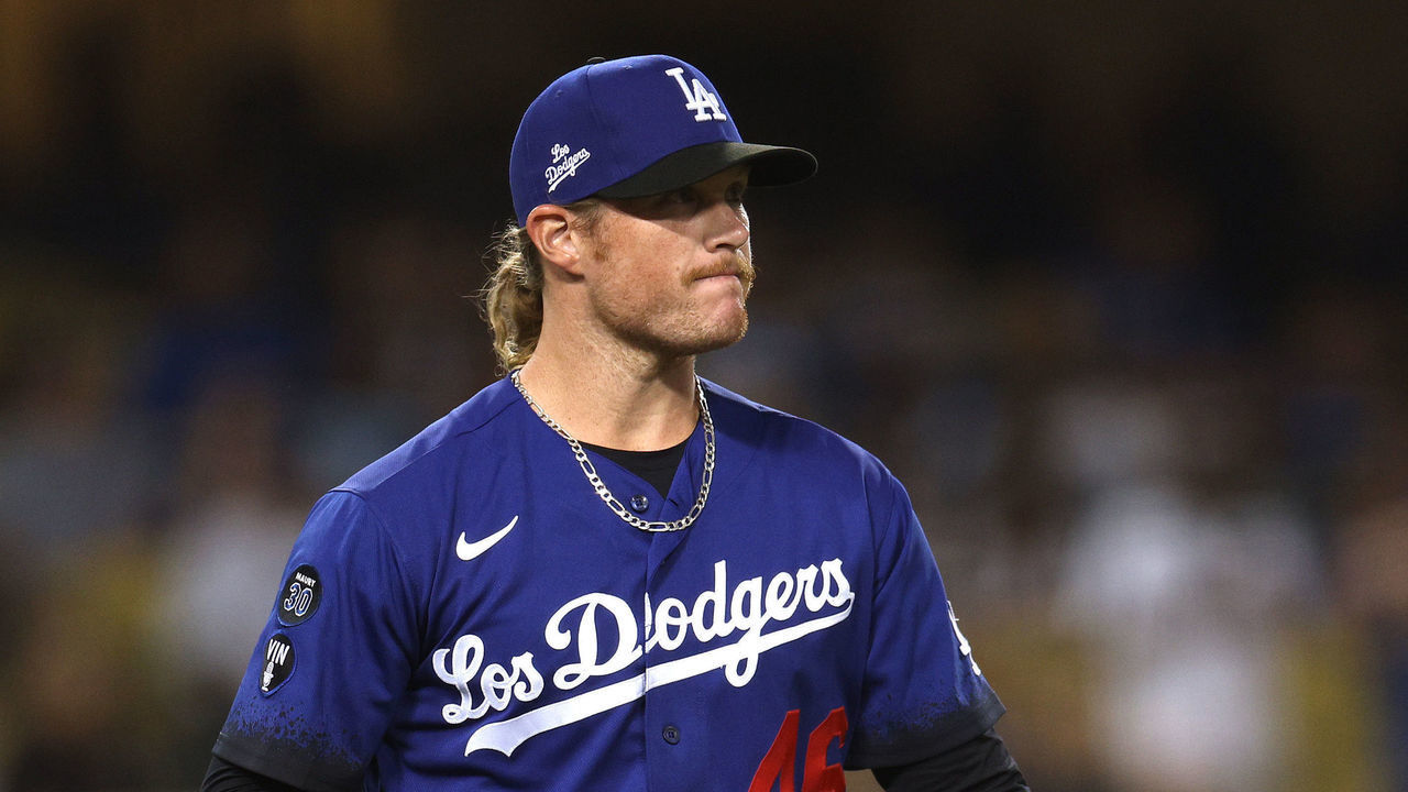 LOS ANGELES, CALIFORNIA - SEPTEMBER 22: Craig Kimbrel #46 of the Los Angeles Dodgers reacts to a Christian Walker #53 of the Arizona Diamondbacks solo homerun, to take a 2-1 lead, during the ninth inning at Dodger Stadium on September 22, 2022 in Los Angeles, California.
