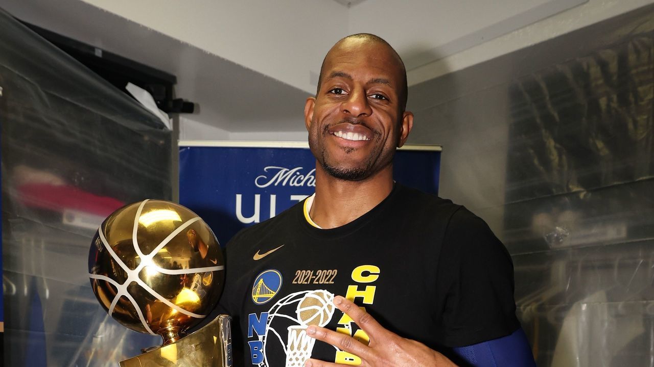 BOSTON, MA - JUNE 16: Andre Iguodala #9 of the Golden State Warriors poses with the Larry O'Brien NBA Championship Trophy after winning game 6 of the NBA finals against the Boston Celtics on June 16, 2022 at TD Garden in Boston, Massachusetts. NOTE TO USER: User expressly acknowledges and agrees that, by downloading and or using this photograph, user is consenting to the terms and conditions of Getty Images License Agreement. Mandatory Copyright Notice: Copyright 2022 NBAE