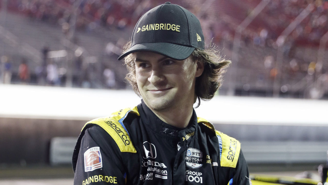 MADISON, IL - AUGUST 20: NTT IndyCar series driver Colton Herta waits out a rain delay during the Bommarito Automotive Group 500 on August 20, 2022, at World Wide Technology Raceway in Madison, Illinois.