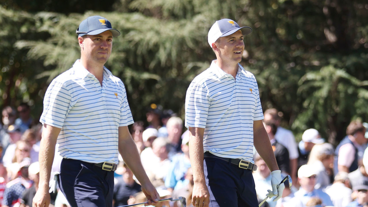 CHARLOTTE, NORTH CAROLINA - SEPTEMBER 23: (L-R) Justin Thomas of the United States Team and Jordan Spieth of the United States Team walk off the tenth tee during Friday four-ball matches on day two of the 2022 Presidents Cup at Quail Hollow Country Club on September 23, 2022 in Charlotte, North Carolina.