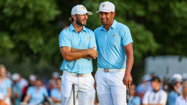 CHARLOTTE, NC - SEPTEMBER 22: U.S. Team Members Tony Finau and Max Homa share a laugh on the 18th green during the first round of the Presidents Cup on Sep 22, 2022, at Quail Hollow Club in Charlotte, NC.