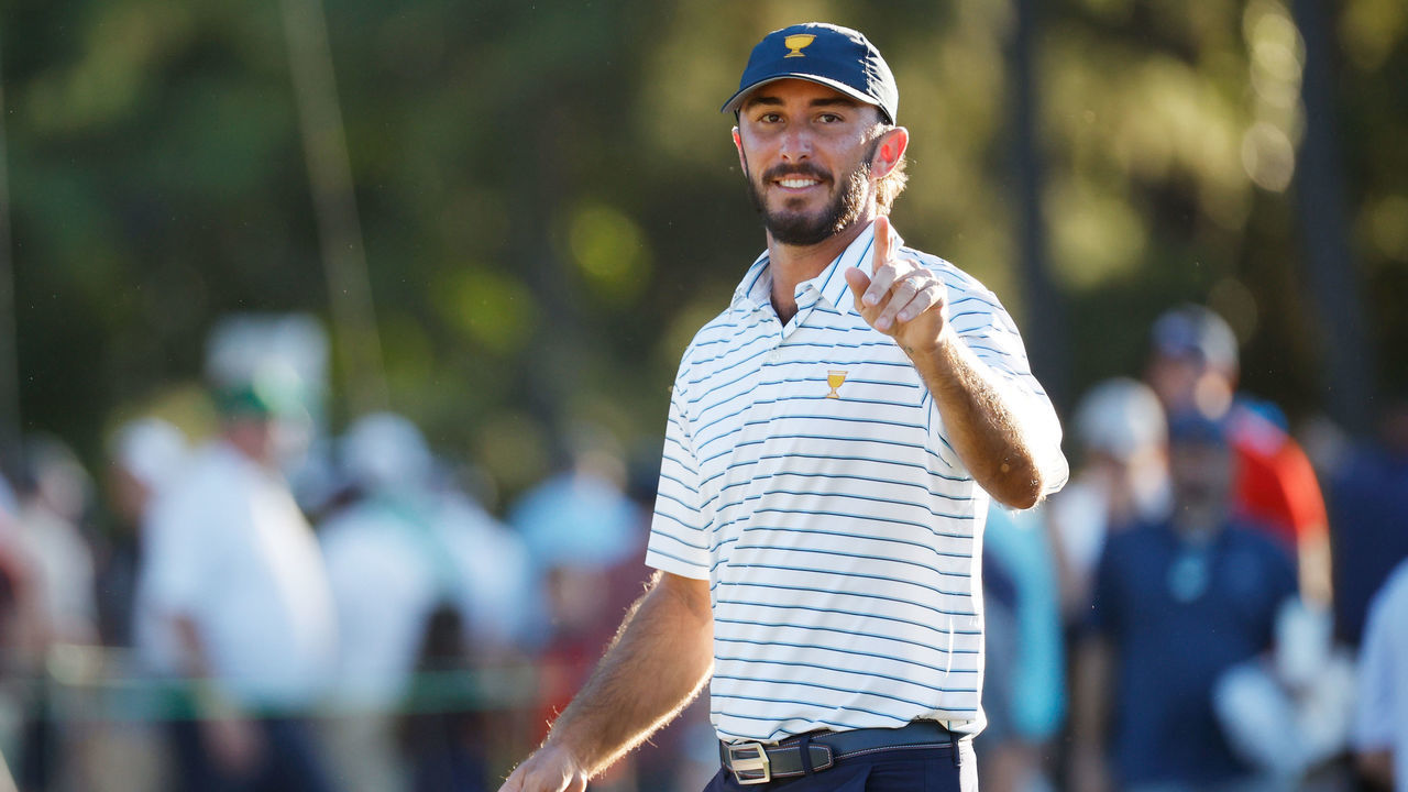 CHARLOTTE, NORTH CAROLINA - SEPTEMBER 23: Max Homa of the United States Team celebrates after making his putt on the 18th green to win with teammate Billy Horschel 1 Up against Corey Conners of Canada and Taylor Pendrith of Canada and the International Team during Friday four-ball matches on day two of the 2022 Presidents Cup at Quail Hollow Country Club on September 23, 2022 in Charlotte, North Carolina.