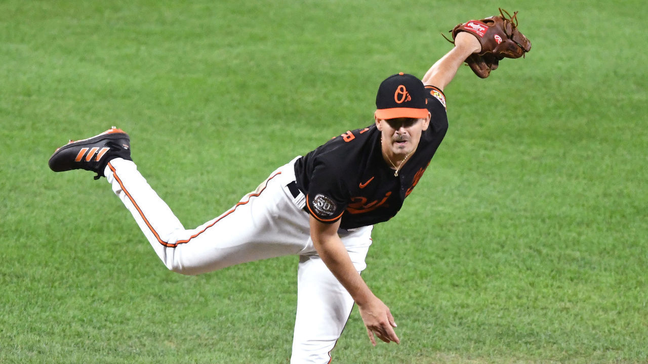 BALTIMORE, MD - SEPTEMBER 23: Dean Kremer #64 of the Baltimore Orioles pitches in the ninth inning during a baseball game against the Houston Astros at Oriole Park at Camden Yards on September 23, 2022 in Baltimore, Maryland.