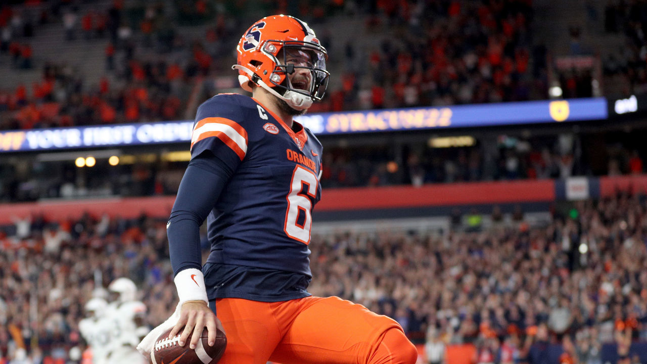 SYRACUSE, NEW YORK - SEPTEMBER 23: Garrett Shrader #6 of the Syracuse Orange scores a touchdown during the first quarter against the Virginia Cavaliers at JMA Wireless Dome on September 23, 2022 in Syracuse, New York.