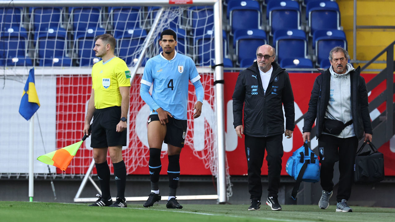 ST. POELTEN, AUSTRIA - SEPTEMBER 23: Ronald Araujo of Uruguay goes off injured during the International Friendly match between Iran and Uruguay at NV Arena on September 23, 2022 in St. Poelten, Austria.