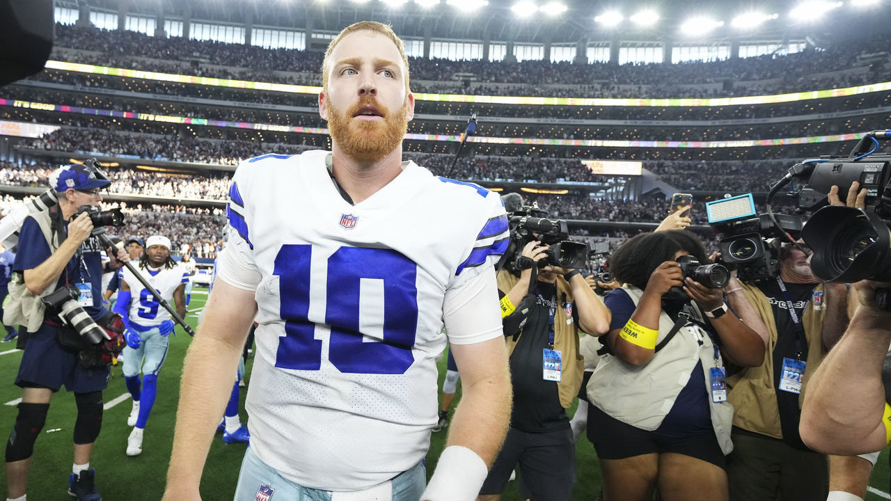 ARLINGTON, TX - SEPTEMBER 18: Cooper Rush #10 of the Dallas Cowboys celebrates with teammates against the Cincinnati Bengals at AT&T Stadium on September 18, 2022 in Arlington, Texas.