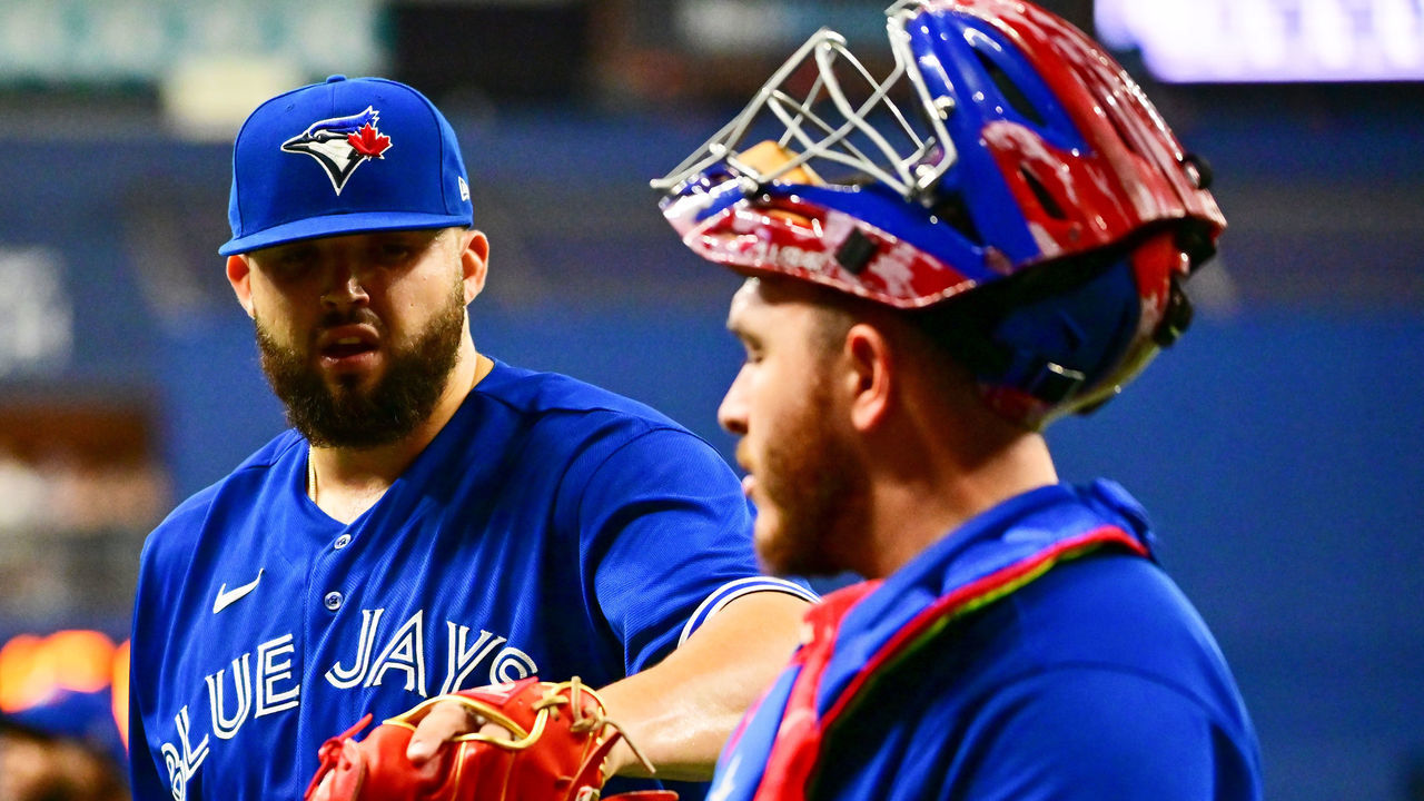 ST PETERSBURG, FLORIDA - SEPTEMBER 24: Alek Manoah #6 celebrates with Alejandro Kirk #30 of the Toronto Blue Jays after the fifth inning against the Tampa Bay Rays at Tropicana Field on September 24, 2022 in St Petersburg, Florida.