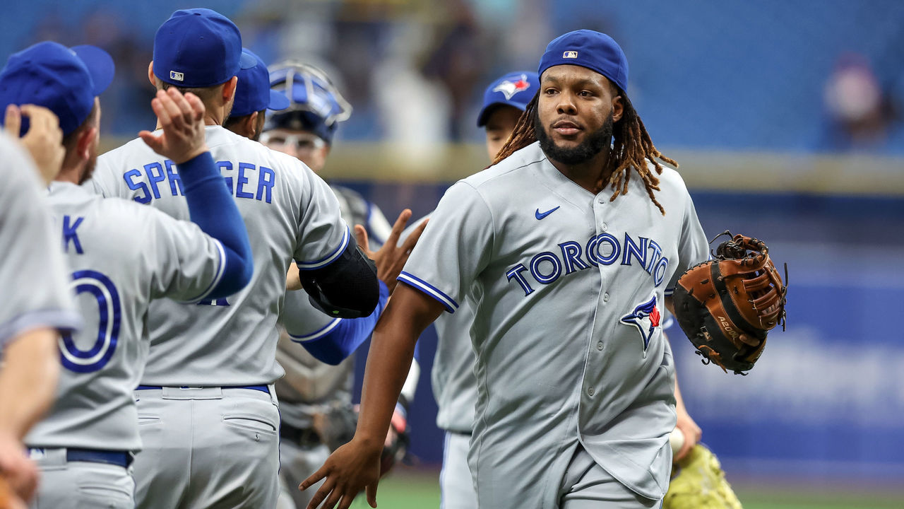 ST. PETERSBURG, FL - SEPTEMBER 25: Vladimir Guerrero Jr. #27 of the Toronto Blue Jays celebrates a win over the Tampa Bay Rays during a baseball game at Tropicana Field on September 25, 2022 in St. Petersburg, Florida.
