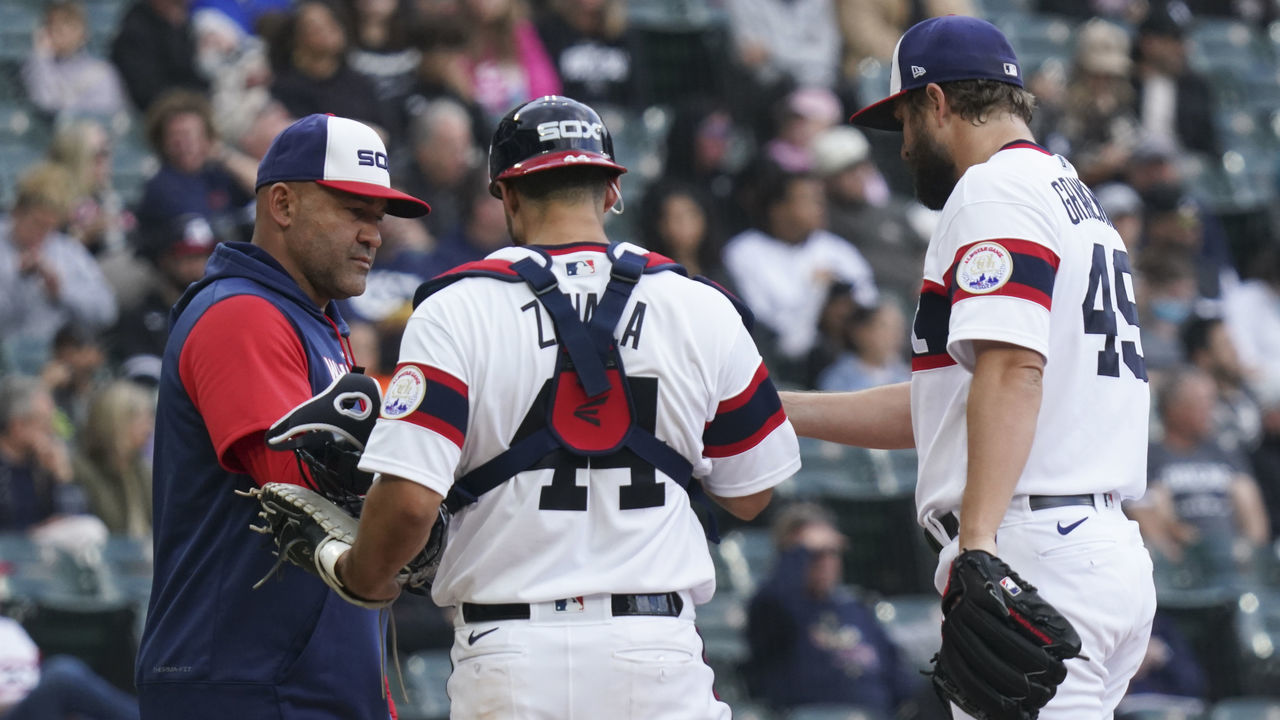 CHICAGO, ILLINOIS - SEPTEMBER 25: Acting manager Miguel Cairo #41 of the Chicago White Sox removes Kendall Graveman #49 of the Chicago White Sox during the eighth inning of a game against the Detroit Tigers at Guaranteed Rate Field on September 25, 2022 in Chicago, Illinois. The Tigers defeated the White Sox 4-1.
