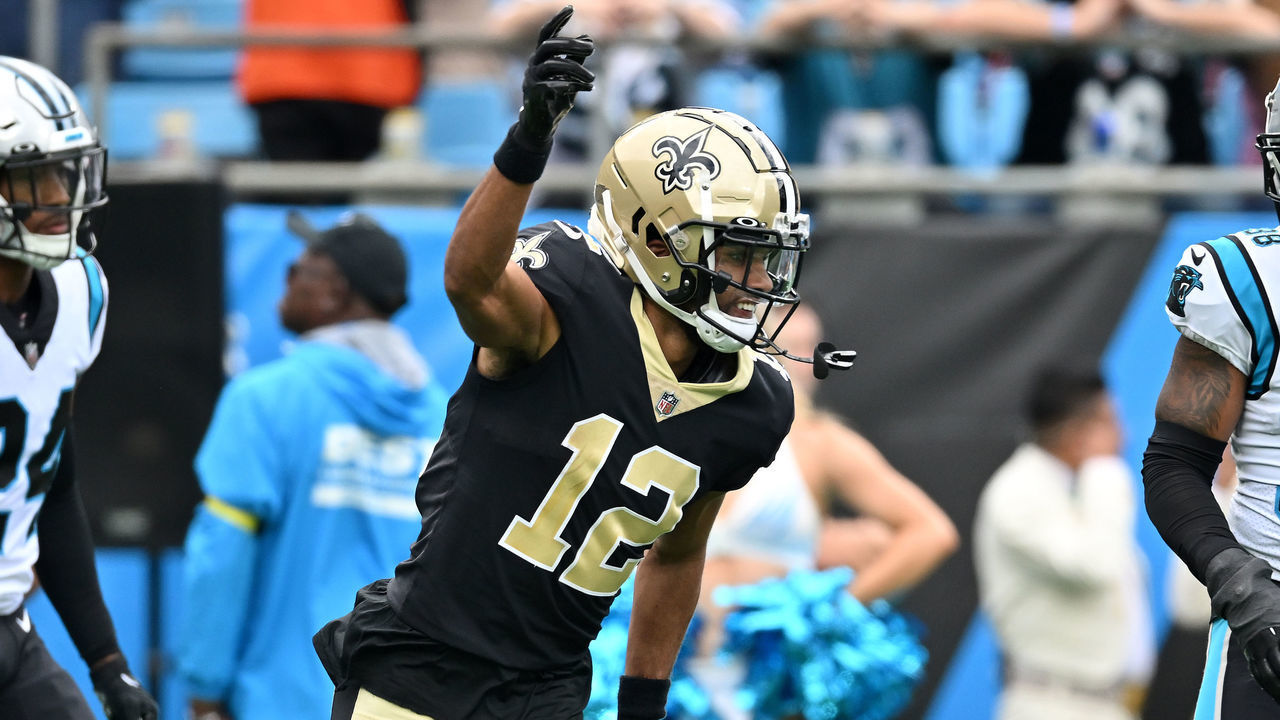 CHARLOTTE, NORTH CAROLINA - SEPTEMBER 25: Chris Olave #12 of the New Orleans Saints reacts after making a catch against the Carolina Panthers during the second quarter at Bank of America Stadium on September 25, 2022 in Charlotte, North Carolina.
