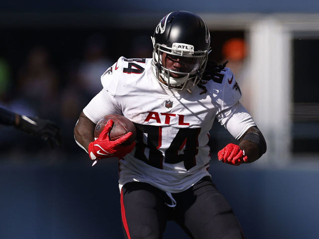 FILE - Atlanta Falcons running back Cordarrelle Patterson runs on his way  to scoring a touchdown during the first half of an NFL football game  against the Seattle Seahawks on Sept. 25