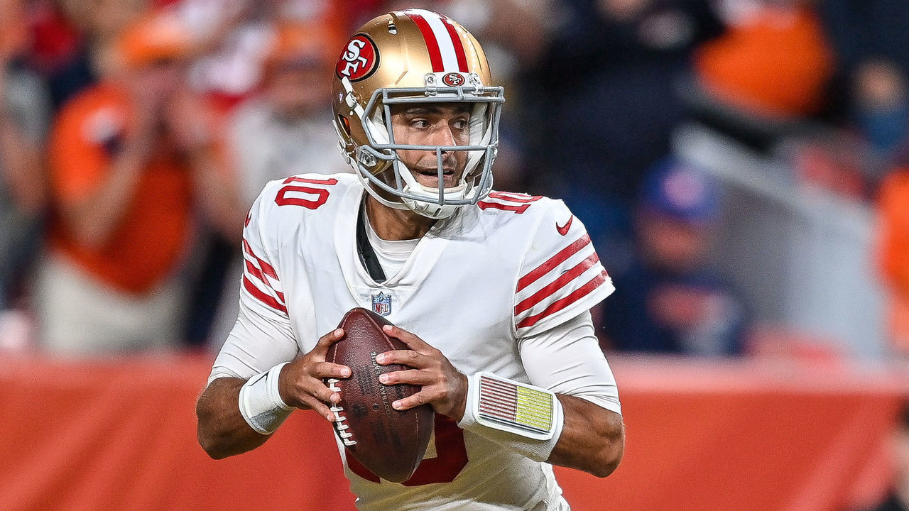 DENVER, CO - SEPTEMBER 25: San Francisco 49ers quarterback Jimmy Garoppolo (10) sets to pass during a game between the San Francisco 49ers and the Denver Broncos at Empower Field at Mile High on September 25, 2022 in Denver, Colorado.