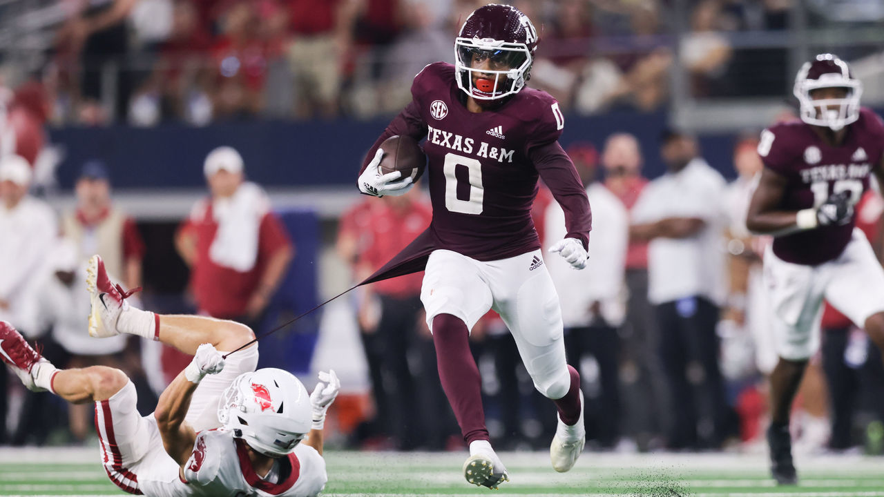 ARLINGTON, TX - SEPTEMBER 24: Texas A&M Aggies wide receiver Ainias Smith (0) carries the ball in the Southwest Classic between the Arkansas Razorbacks and the Texas A&M Aggies on September 24, 2022 at AT&T Stadium in Arlington, TX