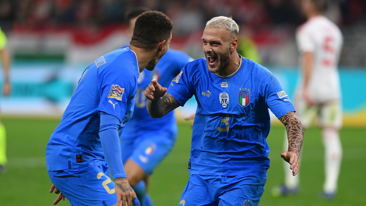 BUDAPEST, HUNGARY - SEPTEMBER 26: Federico Dimarco of Italy celebrates with team-mates after scoring the goal during the UEFA Nations League League A Group 3 match between Hungary and Italy at Puskas Arena on September 26, 2022 in Budapest, Hungary.