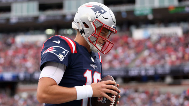 FOXBOROUGH, MASSACHUSETTS - SEPTEMBER 25: Mac Jones #10 of the New England Patriots looks down during the game against the Baltimore Ravens at Gillette Stadium on September 25, 2022 in Foxborough, Massachusetts.
