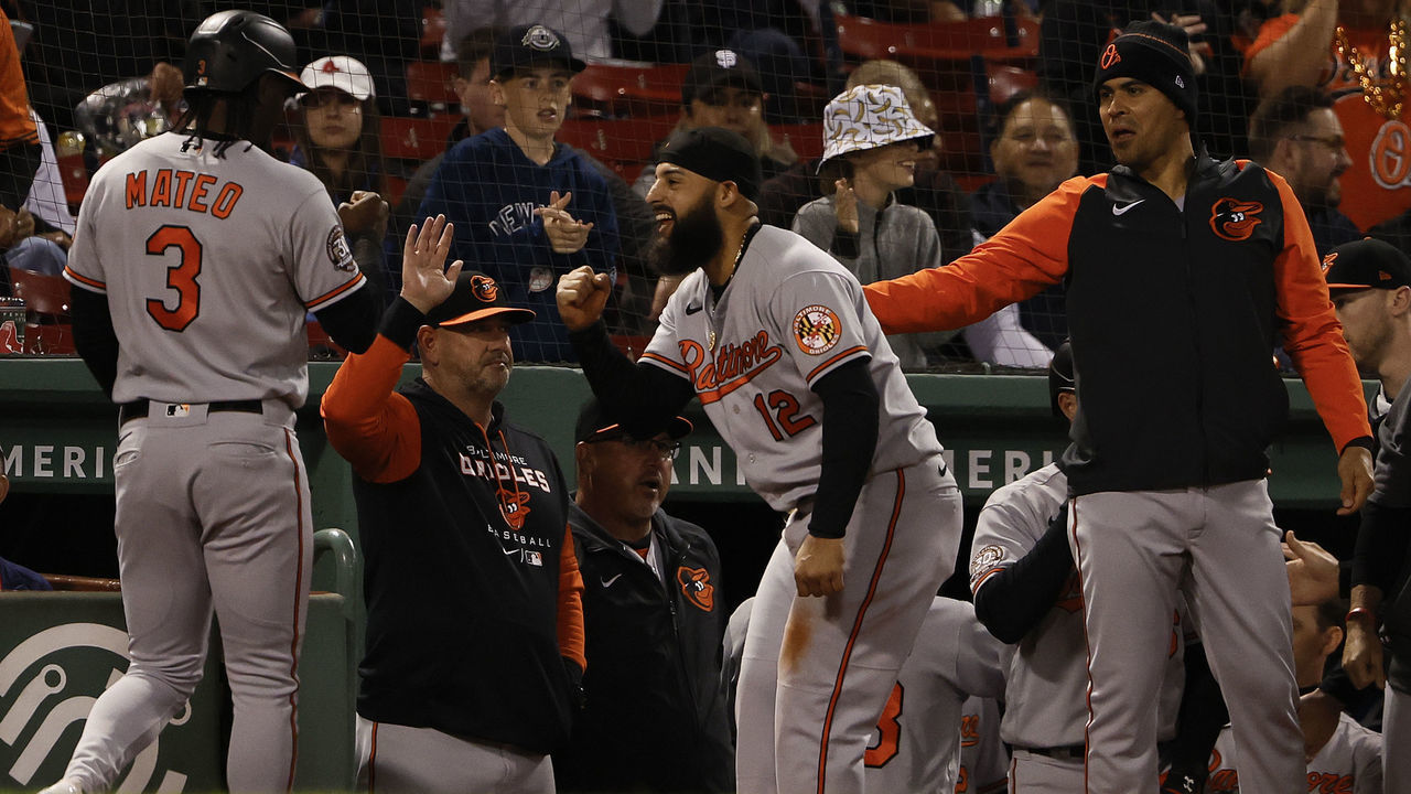 BOSTON, MA - SEPTEMBER 26: Jorge Mateo #3 of the Baltimore Orioles celebrates scoring with Rougned Odor #12 against the Boston Red Sox in the second inning at Fenway Park on September 26, 2022 in Boston, Massachusetts.