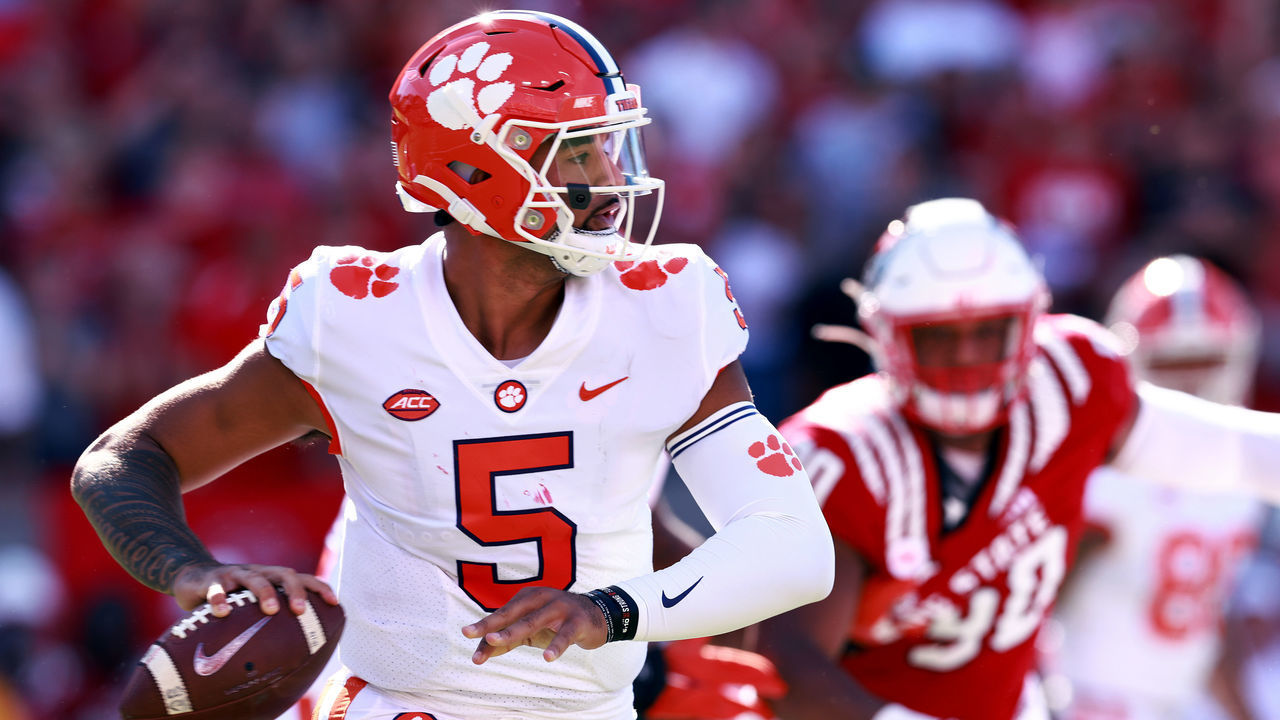 RALEIGH, NORTH CAROLINA - SEPTEMBER 25: D.J. Uiagalelei #5 of the Clemson Tigers looks to pass during their game against the North Carolina State Wolfpack at Carter-Finley Stadium on September 25, 2021 in Raleigh, North Carolina. North Carolina State won 27-21 in double overtime.