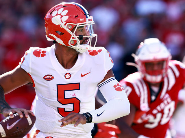 RALEIGH, NORTH CAROLINA - SEPTEMBER 25: D.J. Uiagalelei #5 of the Clemson Tigers looks to pass during their game against the North Carolina State Wolfpack at Carter-Finley Stadium on September 25, 2021 in Raleigh, North Carolina. North Carolina State won 27-21 in double overtime.