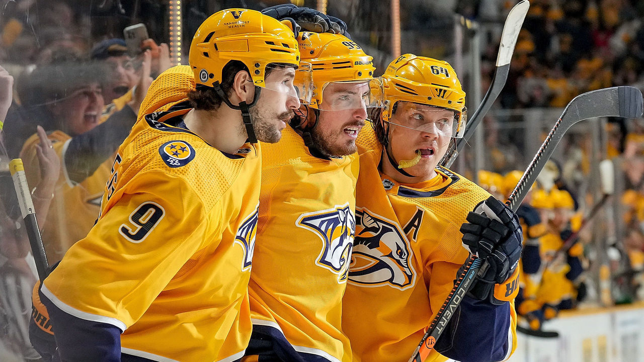NASHVILLE, TN - APRIL 24: Matt Duchene #95 celebrates his goal with Filip Forsberg #9 and Mikael Granlund #64 of the Nashville Predators against the Minnesota Wild during an NHL game at Bridgestone Arena on April 24, 2022 in Nashville, Tennessee.