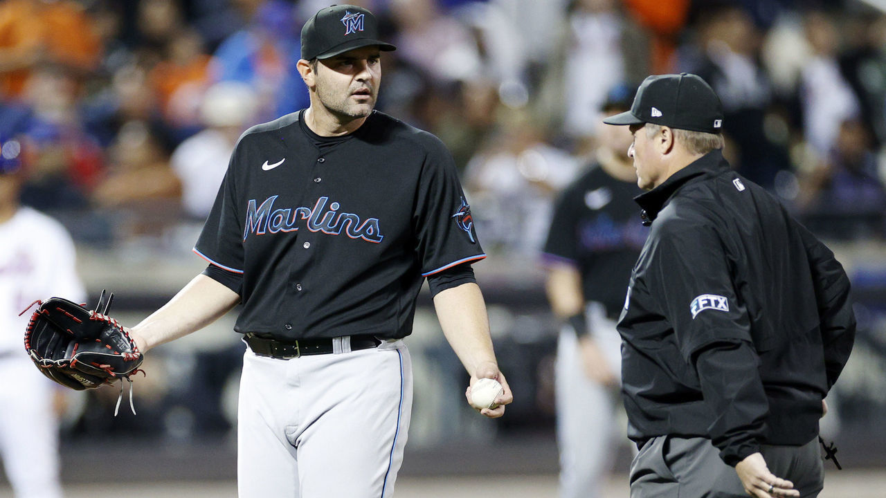 NEW YORK, NEW YORK - SEPTEMBER 27: Richard Bleier #35 of the Miami Marlins reacts toward umpire Marvin Hudson #51 after a call during the eighth inning against the New York Mets at Citi Field on September 27, 2022 in the Queens borough of New York City.