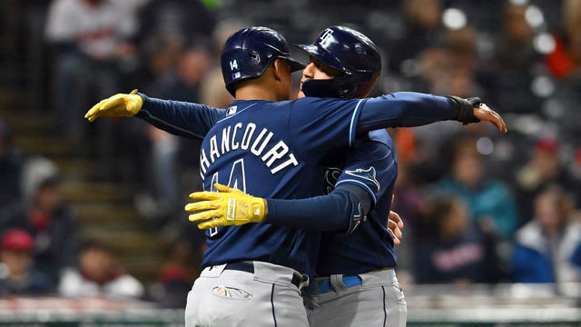 CLEVELAND, OHIO - SEPTEMBER 27: Christian Bethancourt #14 of the Tampa Bay Rays celebrates with Jose Siri #22 after both scored on a home run by Siri against the Cleveland Guardians during the fourth inning at Progressive Field on September 27, 2022 in Cleveland, Ohio.