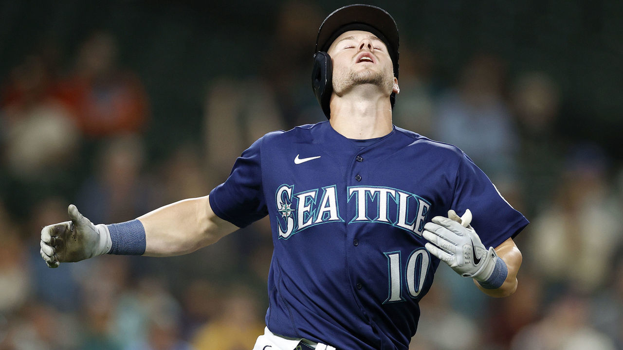 SEATTLE, WASHINGTON - SEPTEMBER 27: Jarred Kelenic #10 of the Seattle Mariners reacts after fouling in the ninth inning against the Texas Rangers at T-Mobile Park on September 27, 2022 in Seattle, Washington.