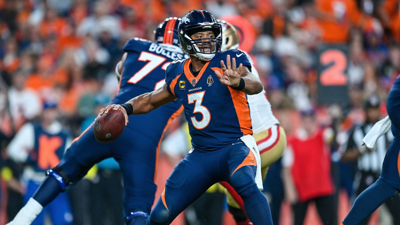 DENVER, CO - SEPTEMBER 25: Denver Broncos quarterback Russell Wilson (3) passes the ball against the San Francisco 49ers during a game between the San Francisco 49ers and the Denver Broncos at Empower Field at Mile High on September 25, 2022 in Denver, Colorado.